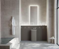 Salle de bains vasque cylindrique minimaliste gris avec portes rainuré sans poignée